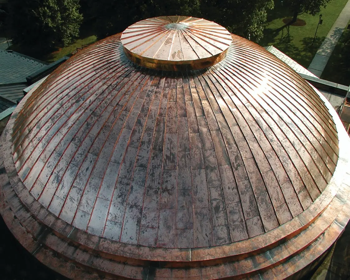 Craftsman Roofing crew installing a new roof in Harrison